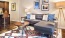 a living room with a couch and a coffee table